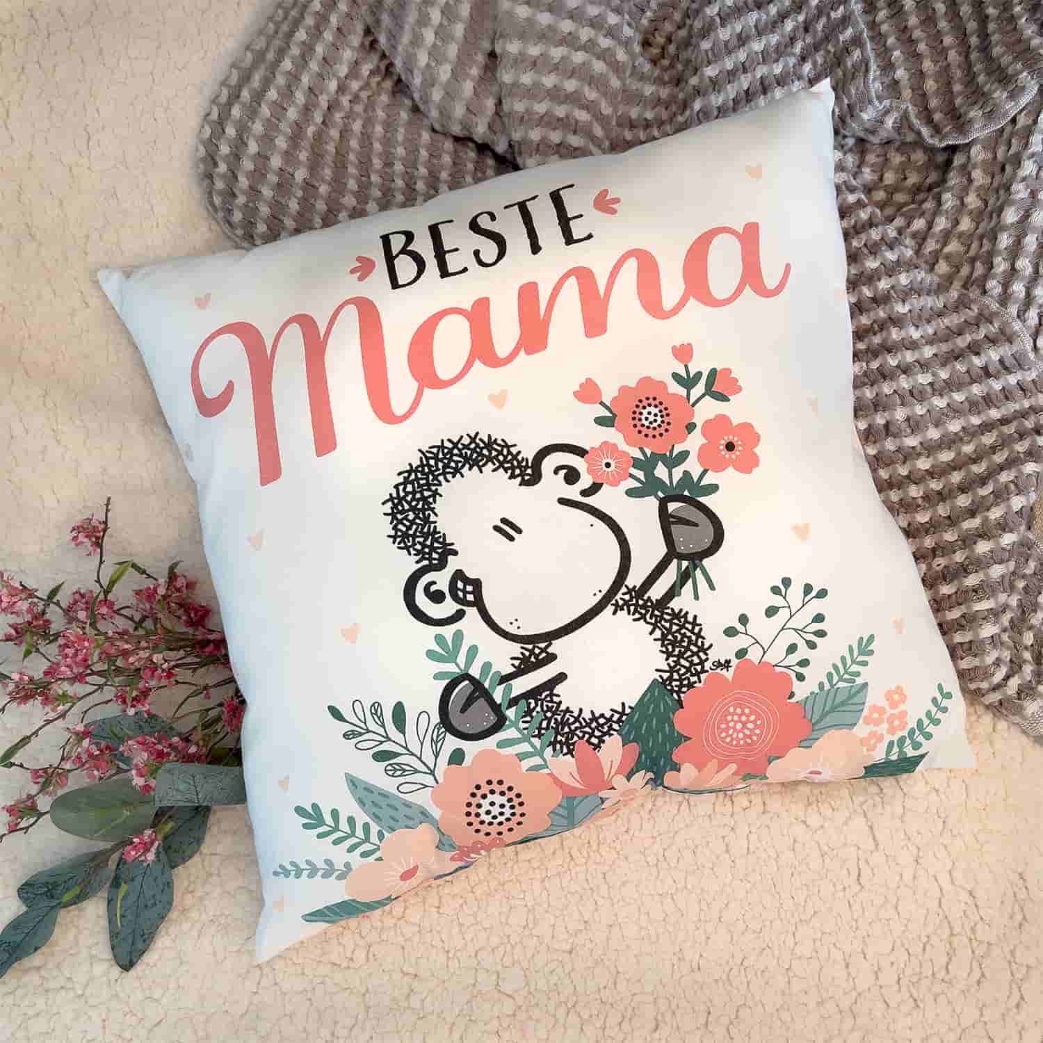 Weißes Kissen mit rosa Akzenten und dem Spruch "Beste Mama"